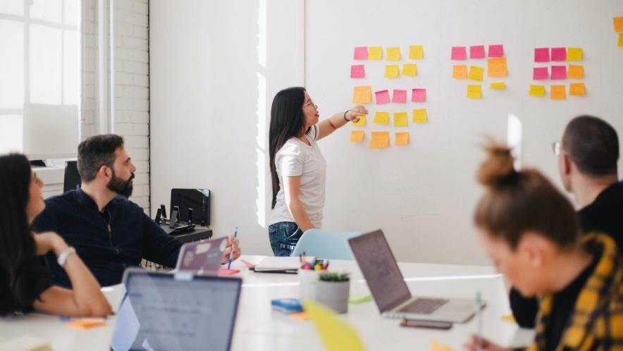 Team brainstorming with sticky notes